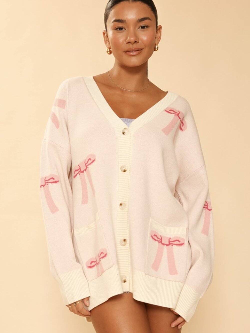 B39 All Over Bow Knit Cardigan Pockets in Pink NEW